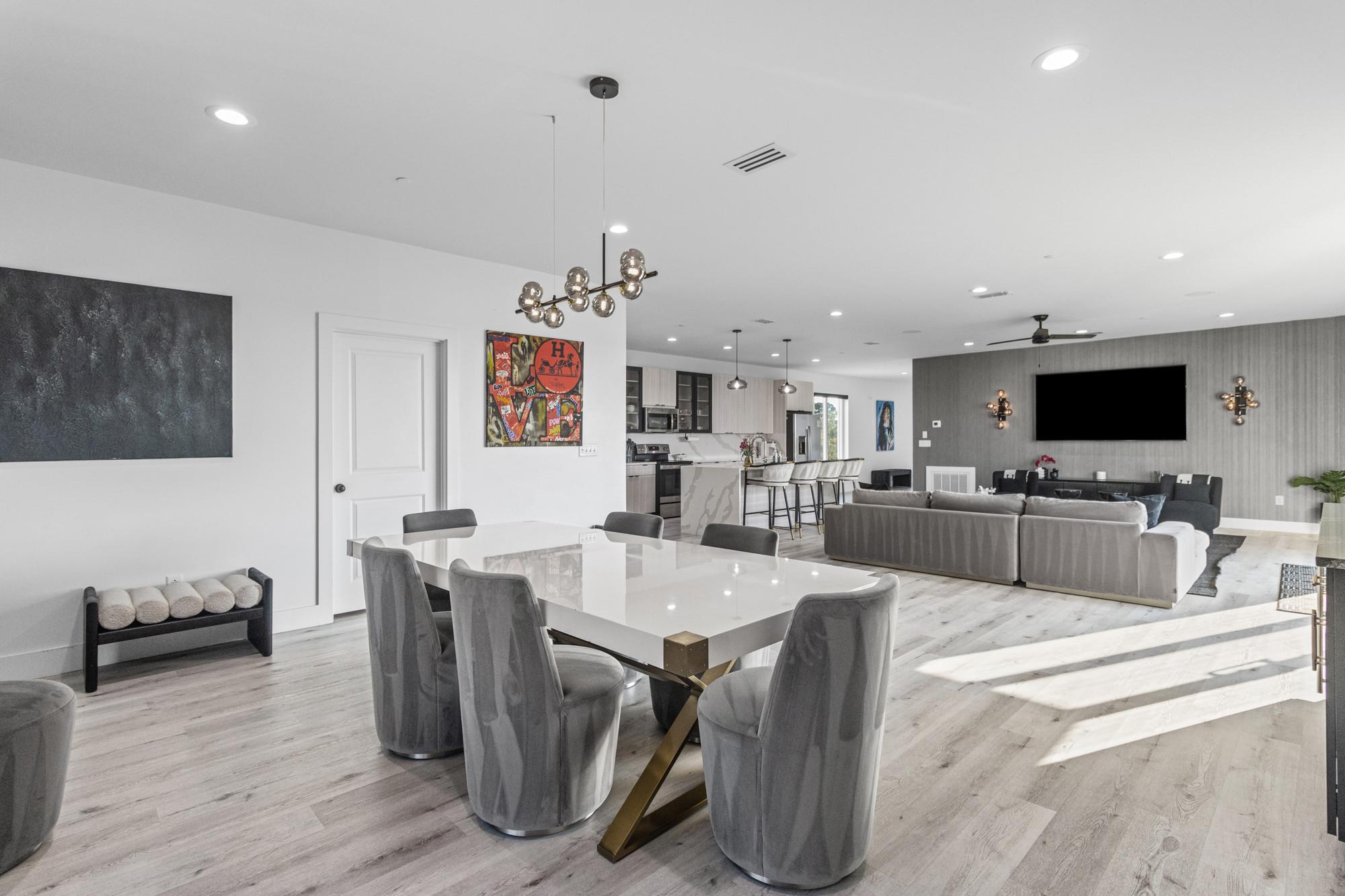 Dining and open kitchen area prepared for guests
